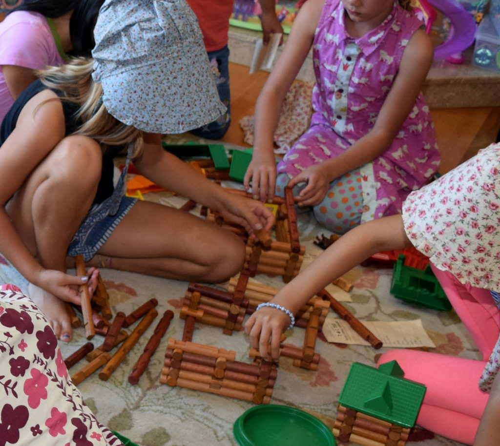 Building Log Cabins with Lincoln Logs. Little House on the Prairie Party Ideas and Activities - MakeHardware.com