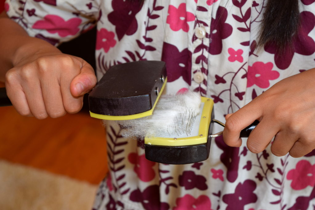 Have kids card washed wool with dollar store dog brushes. Little House on the Prairie Party Ideas and Activities - MakeHardware.com